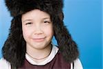 Close-up of a girl wearing a fur hat