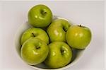 Close-up of green apples in a bowl