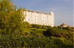 Trees in front of a building, Biarritz, Basque Country, Pyrenees-Atlantiques, Aquitaine, France