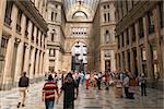 Group of people in a shopping mall, Galleria Umberto I, Naples, Naples Province, Campania, Italy