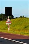 Railroad crossing signboard at the roadside, Loire Valley, France