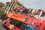 European union flags fluttering on a bus, Piazza Tasso, Sorrento, Naples Province, Campania, Italy