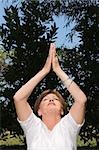 Senior woman practicing yoga