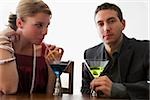 Young couple drinking cocktail