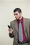 Close-up of a businessman using a mobile phone