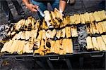 Mid section view of a man selling tamales, Zacatecas State, Mexico