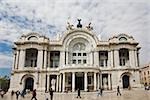 Tourists in front of a palace, Palacio De Bellas Artes, Mexico City, Mexico