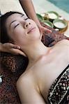 Young woman having neck massage