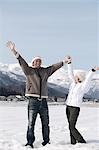 Young couple standing in snow