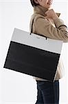 Woman holding shopping bag