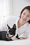 Young woman and Boston Terrier