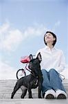 Young woman and French Bulldog