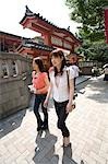 Two women walking in Kagurazaka, Tokyo, Japan