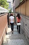 Two women walking in Kagurazaka, Tokyo, Japan