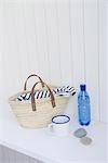 Straw bag and mineral water