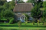 Thatched cottage and garden at Lockeridge in Wiltshire, England, United Kingdom, Europe