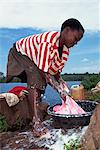 Woman washing clothes, Uganda, East Africa, Africa