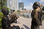 River Merchants, bronze sculpture by Aw Tee Hong depicting city's historic development, on river bank, Boat Quay Conservation Area, Central area, Singapore, Southeast Asia, Asia