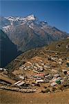 Houses and terraced fields of Namche Bazaar in the Khumbu Region, with mountains in the background, Himalayas, Nepal, Asia