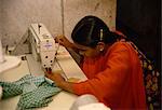 Woman working in garment factory, Dhaka, Bangladesh, Asia