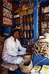 Portrait of an Indian shopkeeper selling ginger root and spices in his shop in Kolkata (Calcutta), West Bengal, India, Asia