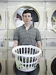 man holding a laundry basket