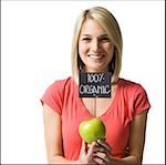 woman with an organic apple