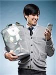 man with a trash can full of cd's and holding an iPod