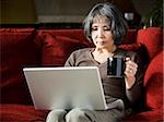 senior woman using a laptop