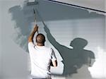 man painting a room