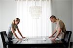 couple spreading out a tablecloth