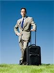 businessman with a rolling suitcase