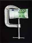 euro in a clamp