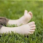 little feet on the grass