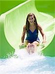 young woman on a waterslide