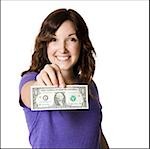 woman holding a dollar bill