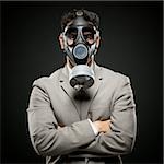 businessman wearing a gas mask