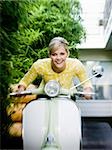 woman on a classic scooter