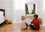 children watching a puppet show