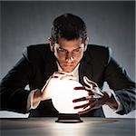 businessman with crystal ball