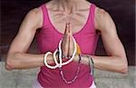 Woman with Praying-Pearls around her Hands - Buddhism - Posture - Meditation