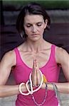 Woman with Praying-Pearls around her Hands - Buddhism - Posture - Meditation