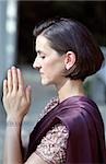 Darkhaired Woman in a Saree has her Hands folded - Tradition - Supplication