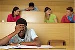 Despaired student attending a lecture