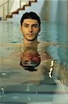 Darkhaired Man in a Swimming-Pool - Sports - Leisure Time