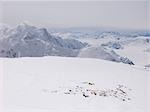 View of the 14,300-foot basin camp from the headwall at 15,500-feet on Denali's West Buttress route at Denali National Park. Spring in Interior Alaska.