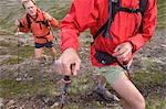 Two men run through the Chugach Mountains a rugged 32-mile link-up of Chugach front range peaks Southcentral Alaska summer