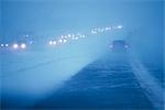 Cars on highway / snowstorm/nview through windshield  AK