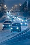Rush hour commmuter traffic on during a snow storm in Anchorage, Alaska