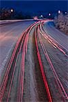 Rush hour commmuter traffic on the Glen highway during a snow storm in Anchorage, Alaska